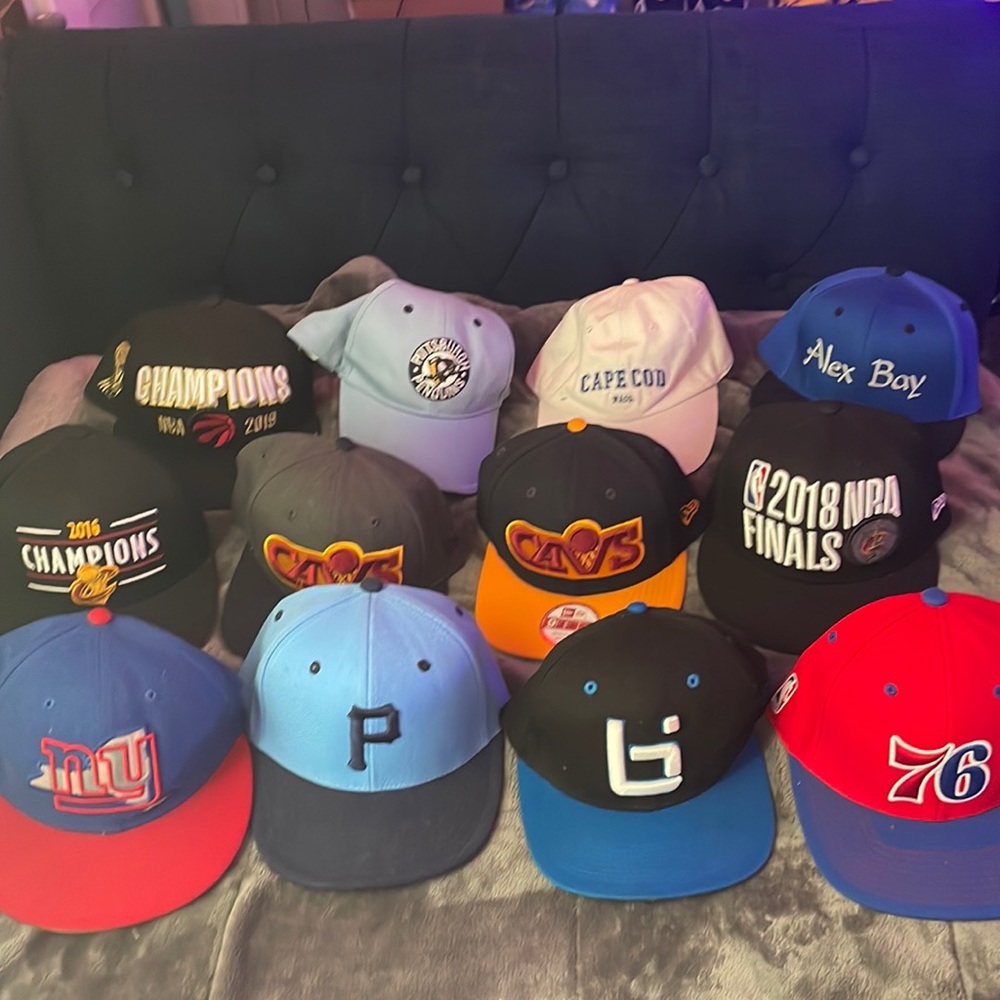 A bunch of sports hats
